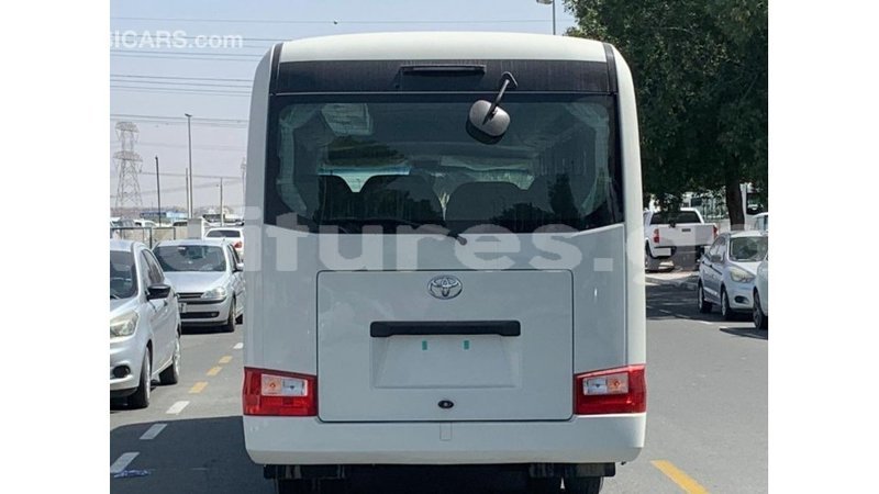 Big with watermark toyota coaster estuaire import dubai 6044