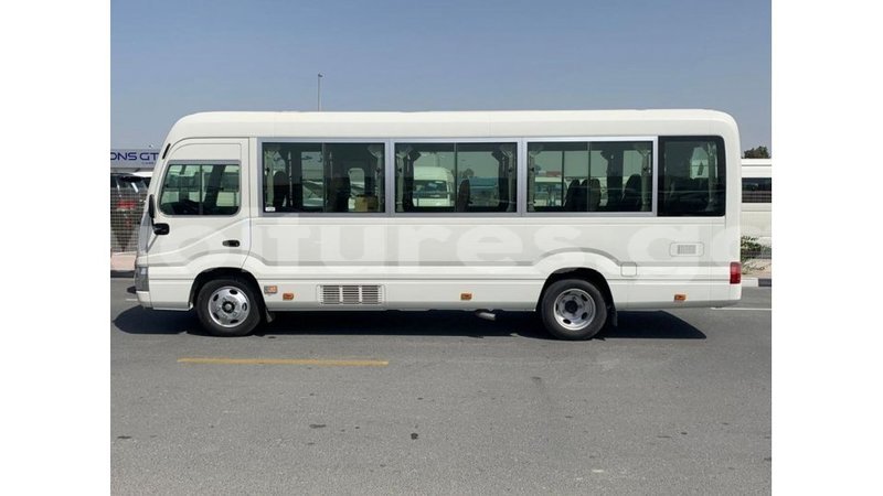 Big with watermark toyota coaster estuaire import dubai 6045