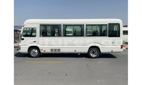 Acheter Import Voiture Toyota Coaster Blanc à Import - Dubai, Estuaire Acheter Import Voiture Toyota Coaster Blanc à Import - Dubai, Estuaire