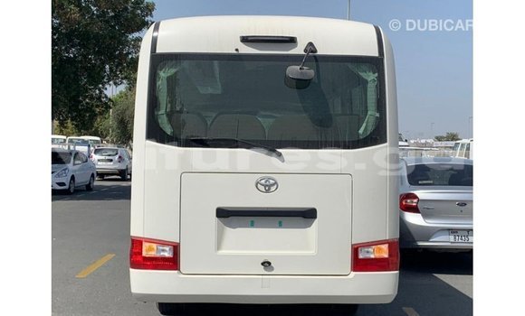 Acheter Import Voiture Toyota Coaster Blanc à Import - Dubai, Estuaire Acheter Import Voiture Toyota Coaster Blanc à Import - Dubai, Estuaire
