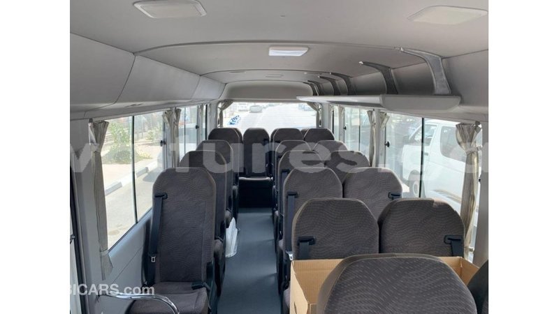 Big with watermark toyota coaster estuaire import dubai 6045