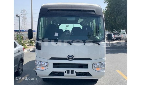 Acheter Import Voiture Toyota Coaster Blanc à Import - Dubai, Estuaire Acheter Import Voiture Toyota Coaster Blanc à Import - Dubai, Estuaire