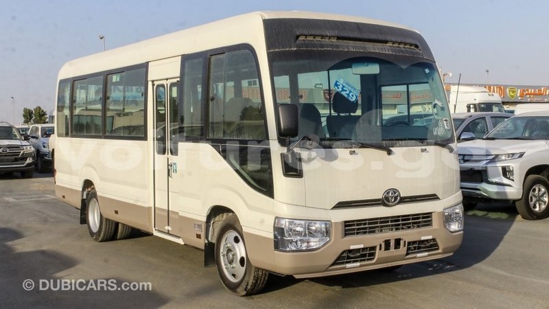 Big with watermark toyota coaster estuaire import dubai 6068