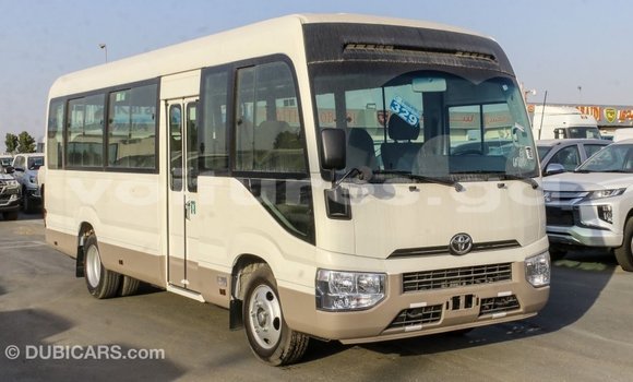 Acheter Import Voiture Toyota Coaster Blanc à Import - Dubai, Estuaire Acheter Import Voiture Toyota Coaster Blanc à Import - Dubai, Estuaire