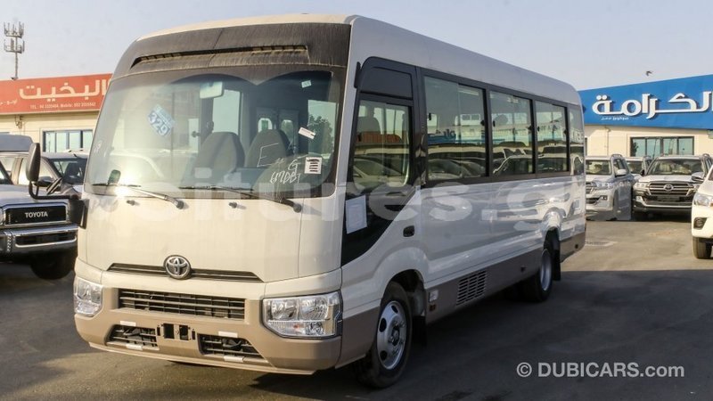 Big with watermark toyota coaster estuaire import dubai 6068