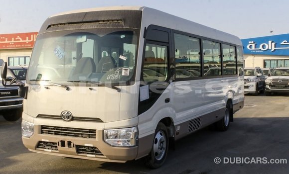 Acheter Import Voiture Toyota Coaster Blanc à Import - Dubai, Estuaire Acheter Import Voiture Toyota Coaster Blanc à Import - Dubai, Estuaire