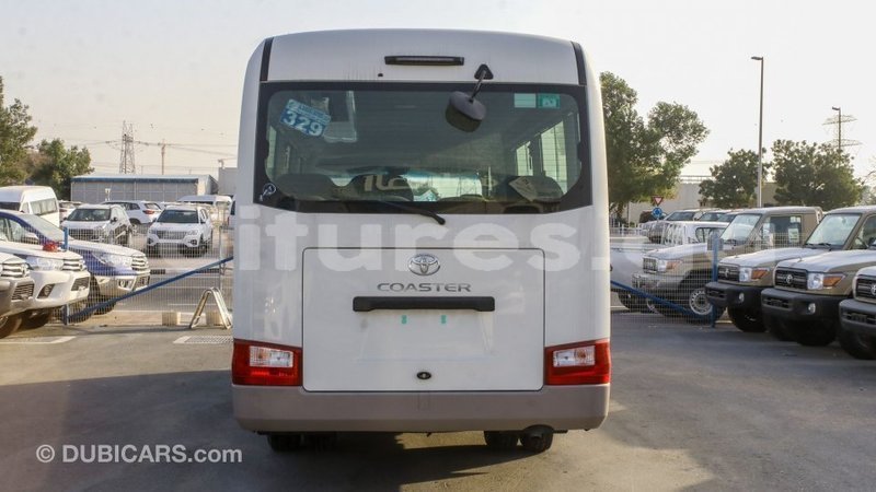 Big with watermark toyota coaster estuaire import dubai 6068