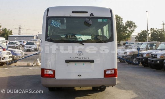 Acheter Import Voiture Toyota Coaster Blanc à Import - Dubai, Estuaire Acheter Import Voiture Toyota Coaster Blanc à Import - Dubai, Estuaire