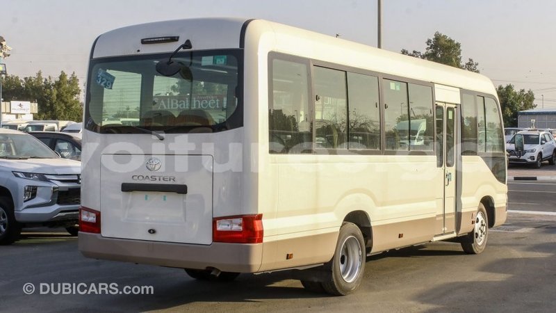 Big with watermark toyota coaster estuaire import dubai 6068