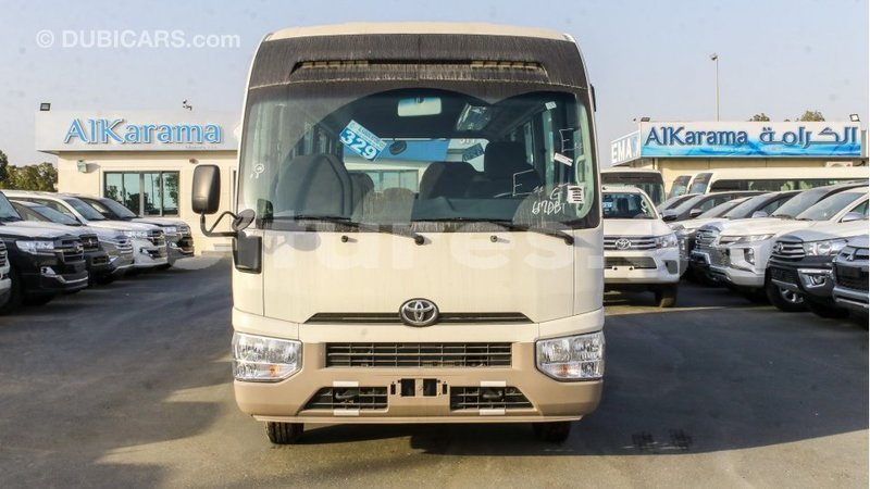 Big with watermark toyota coaster estuaire import dubai 6216