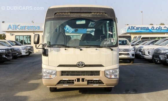 Acheter Import Voiture Toyota Coaster Blanc à Import - Dubai, Estuaire Acheter Import Voiture Toyota Coaster Blanc à Import - Dubai, Estuaire
