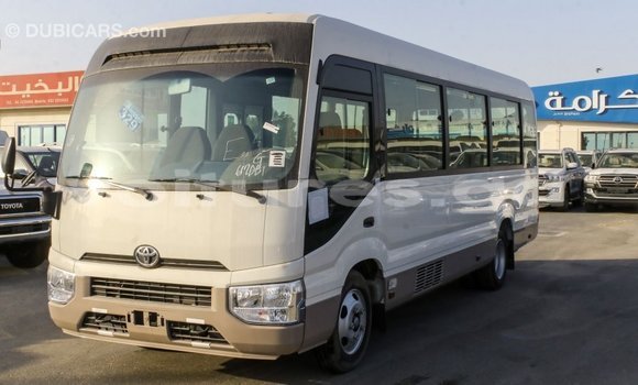 Acheter Import Voiture Toyota Coaster Blanc à Import - Dubai, Estuaire Acheter Import Voiture Toyota Coaster Blanc à Import - Dubai, Estuaire