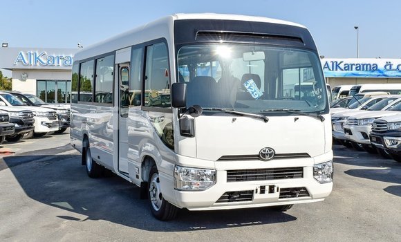 Acheter Import Voiture Toyota Coaster Blanc à Import - Dubai, Estuaire Acheter Import Voiture Toyota Coaster Blanc à Import - Dubai, Estuaire