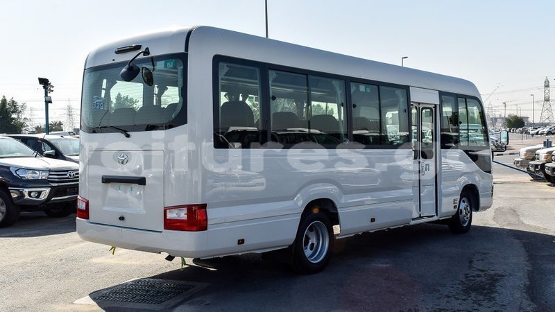 Big with watermark toyota coaster estuaire import dubai 6276