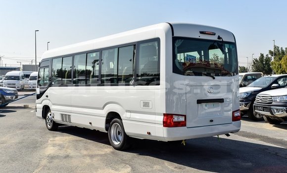 Acheter Import Voiture Toyota Coaster Blanc à Import - Dubai, Estuaire Acheter Import Voiture Toyota Coaster Blanc à Import - Dubai, Estuaire
