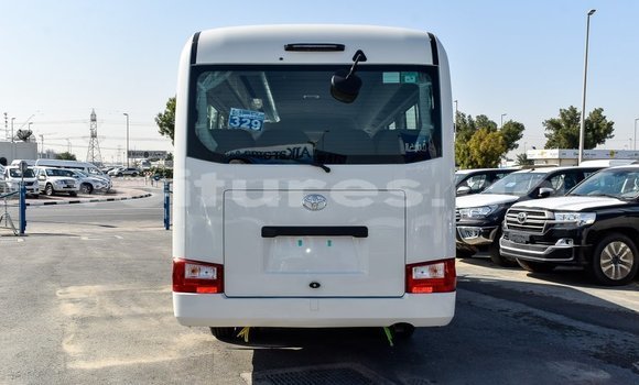 Acheter Import Voiture Toyota Coaster Blanc à Import - Dubai, Estuaire Acheter Import Voiture Toyota Coaster Blanc à Import - Dubai, Estuaire
