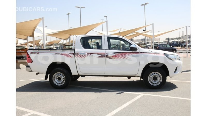 Big with watermark toyota hilux estuary import dubai 6392