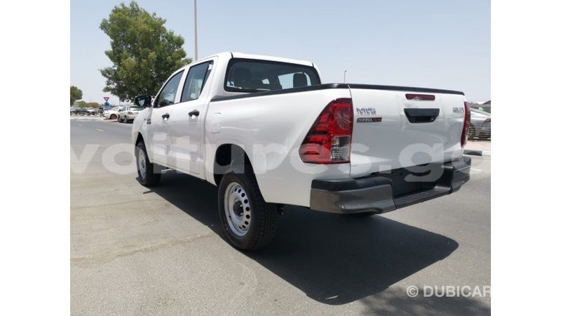 Big with watermark toyota hilux estuary import dubai 6524