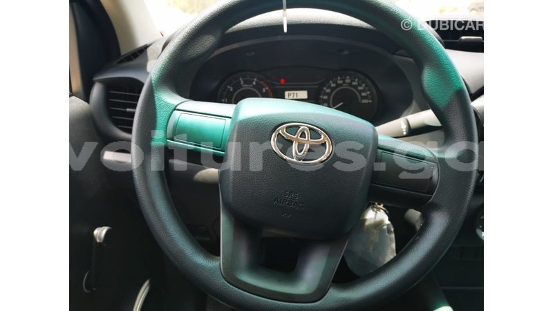 Big with watermark toyota hilux estuary import dubai 6524