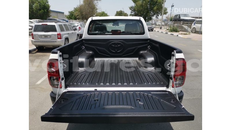 Big with watermark toyota hilux estuary import dubai 6524