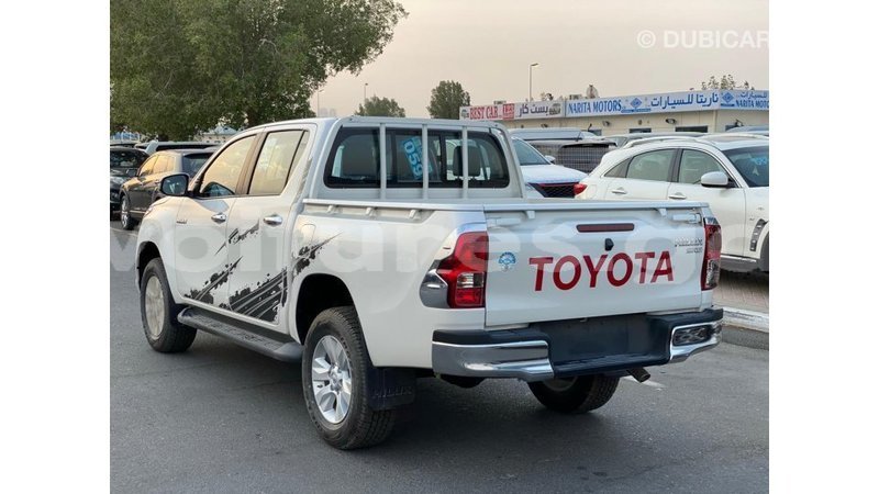 Big with watermark toyota hilux estuary import dubai 6715