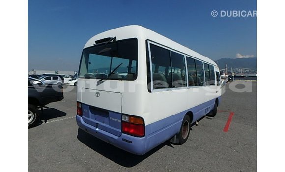Acheter Import Voiture Toyota Coaster Blanc à Import - Dubai, Estuaire Acheter Import Voiture Toyota Coaster Blanc à Import - Dubai, Estuaire