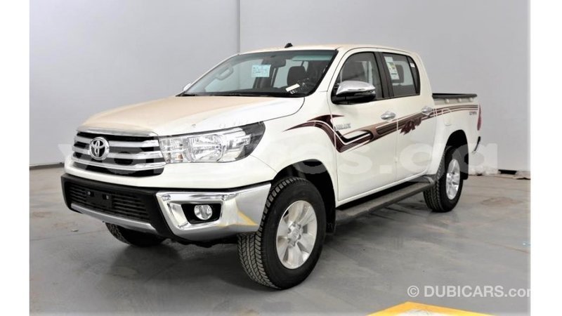 Big with watermark toyota hilux estuary import dubai 6819