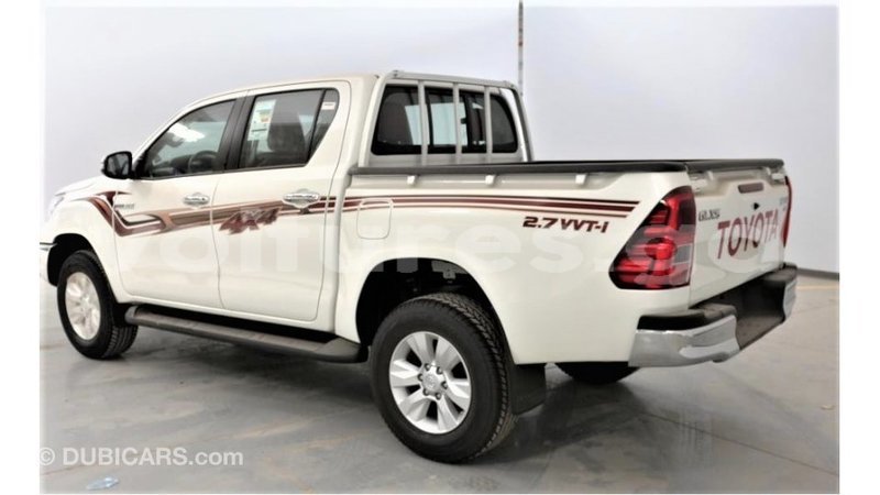 Big with watermark toyota hilux estuary import dubai 6819