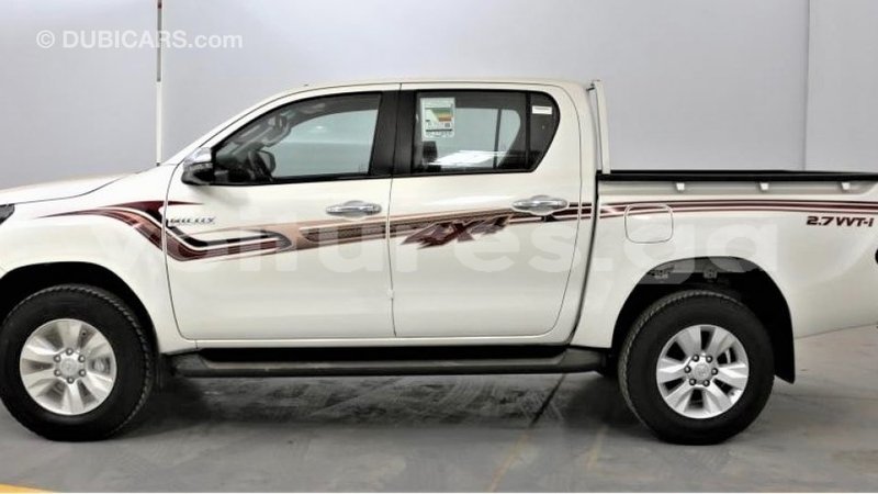 Big with watermark toyota hilux estuary import dubai 6819