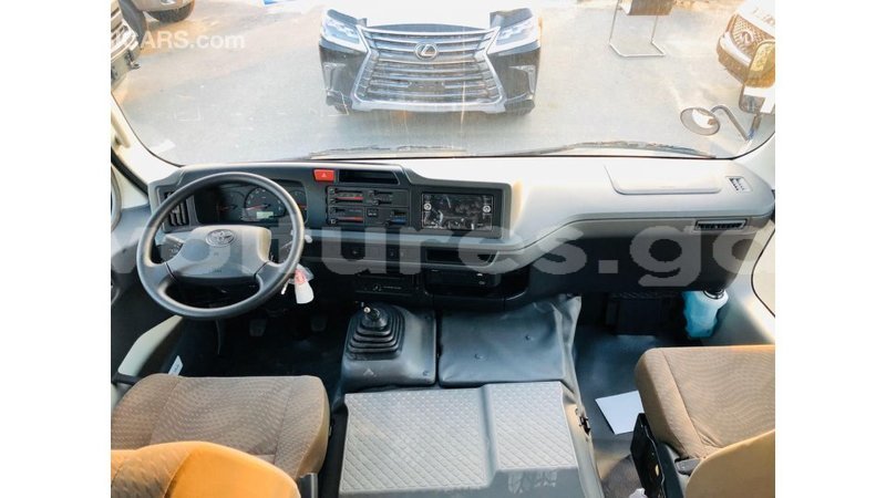 Big with watermark toyota coaster estuary import dubai 6826