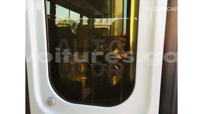 Big with watermark toyota coaster estuary import dubai 6826