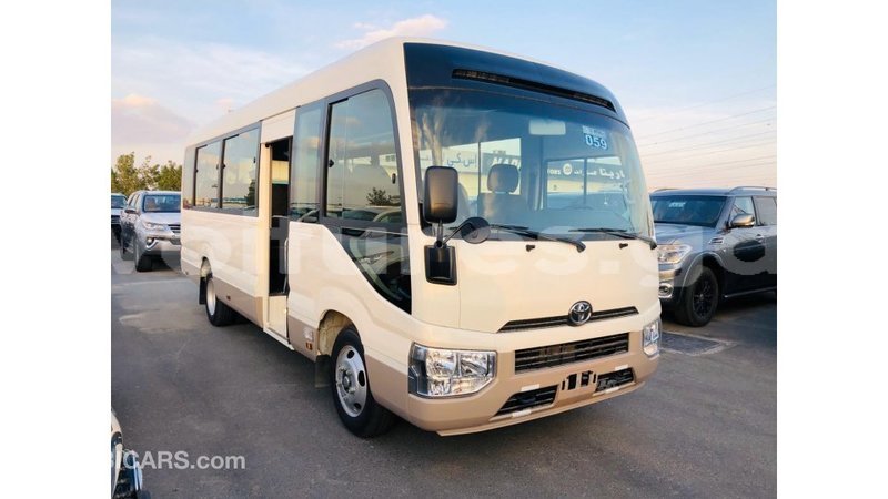 Big with watermark toyota coaster estuary import dubai 6826