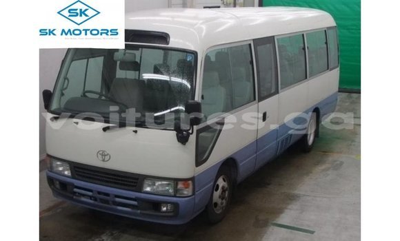 Acheter Import Voiture Toyota Coaster Blanc à Import - Dubai, Estuaire Acheter Import Voiture Toyota Coaster Blanc à Import - Dubai, Estuaire