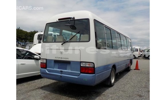 Acheter Import Voiture Toyota Coaster Blanc à Import - Dubai, Estuaire Acheter Import Voiture Toyota Coaster Blanc à Import - Dubai, Estuaire