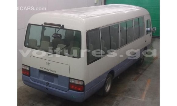 Acheter Import Voiture Toyota Coaster Blanc à Import - Dubai, Estuaire Acheter Import Voiture Toyota Coaster Blanc à Import - Dubai, Estuaire