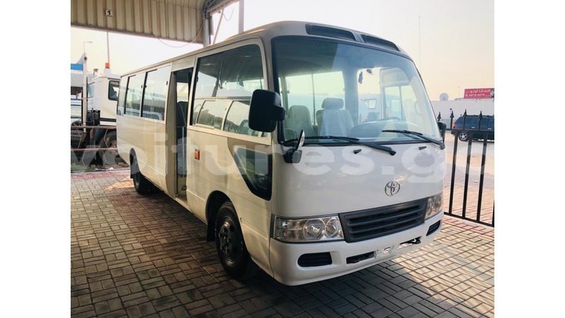 Big with watermark toyota coaster estuary import dubai 7010