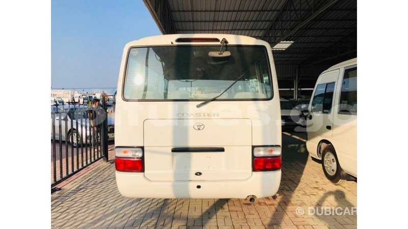 Big with watermark toyota coaster estuary import dubai 7010