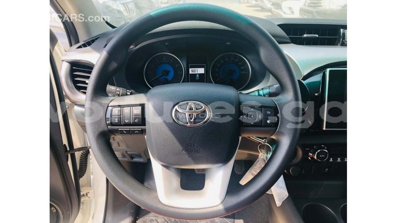 Big with watermark toyota hilux estuary import dubai 7052