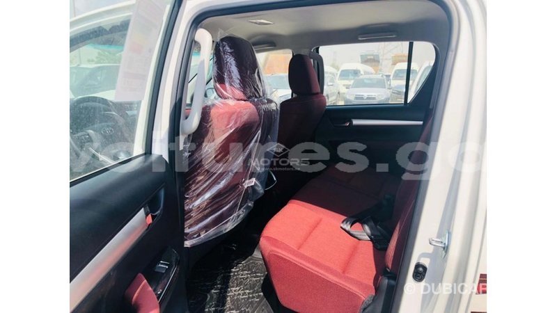 Big with watermark toyota hilux estuary import dubai 7052