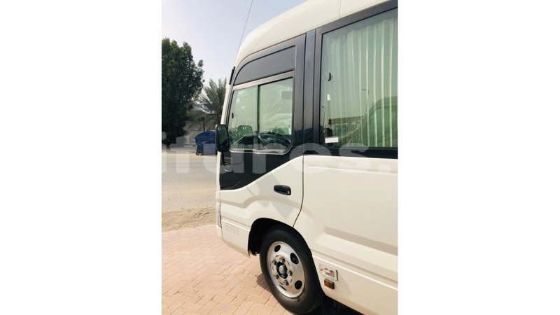 Big with watermark toyota coaster estuary import dubai 7105