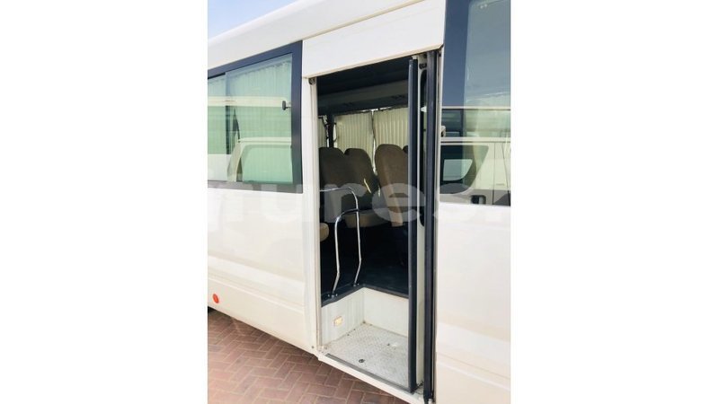 Big with watermark toyota coaster estuary import dubai 7105