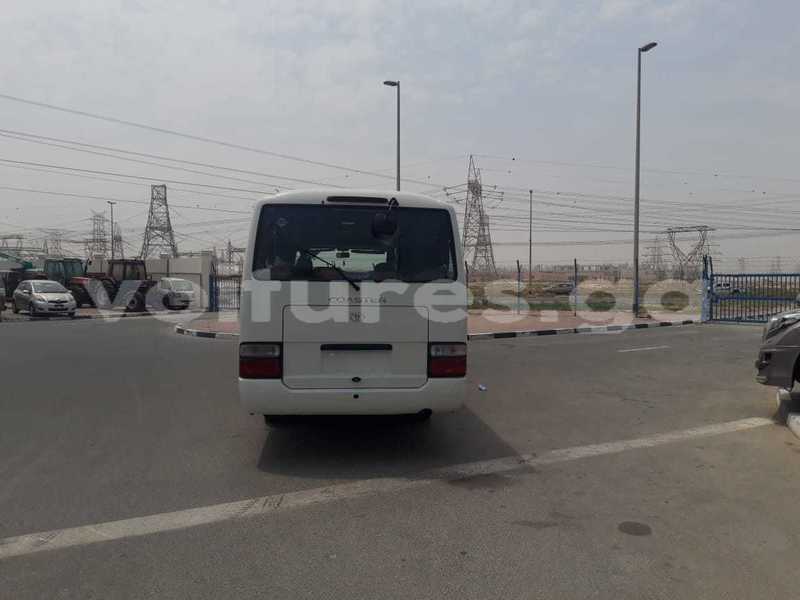 Big with watermark toyota coaster estuaire import dubai 7164